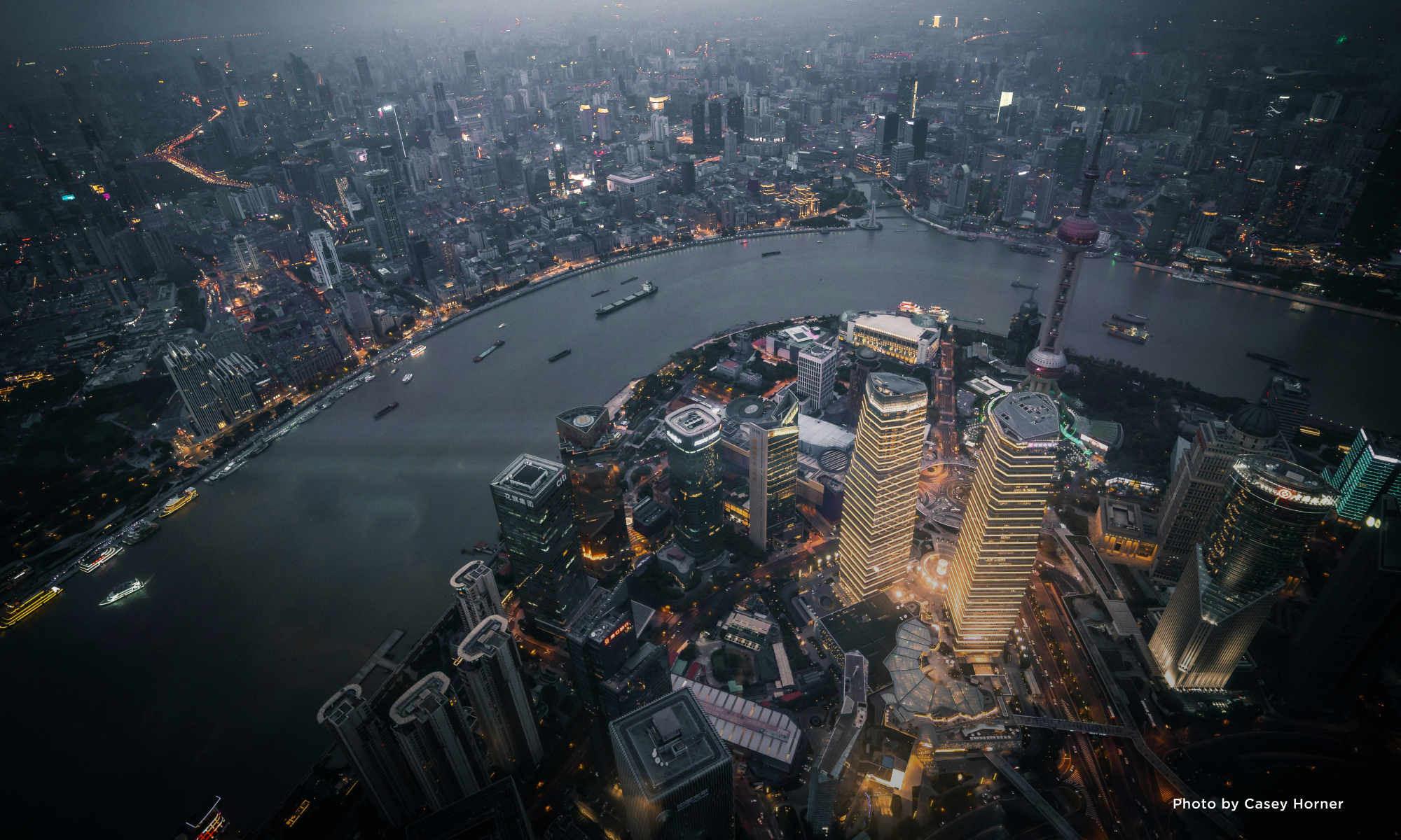 Drone photo of New York City at night.